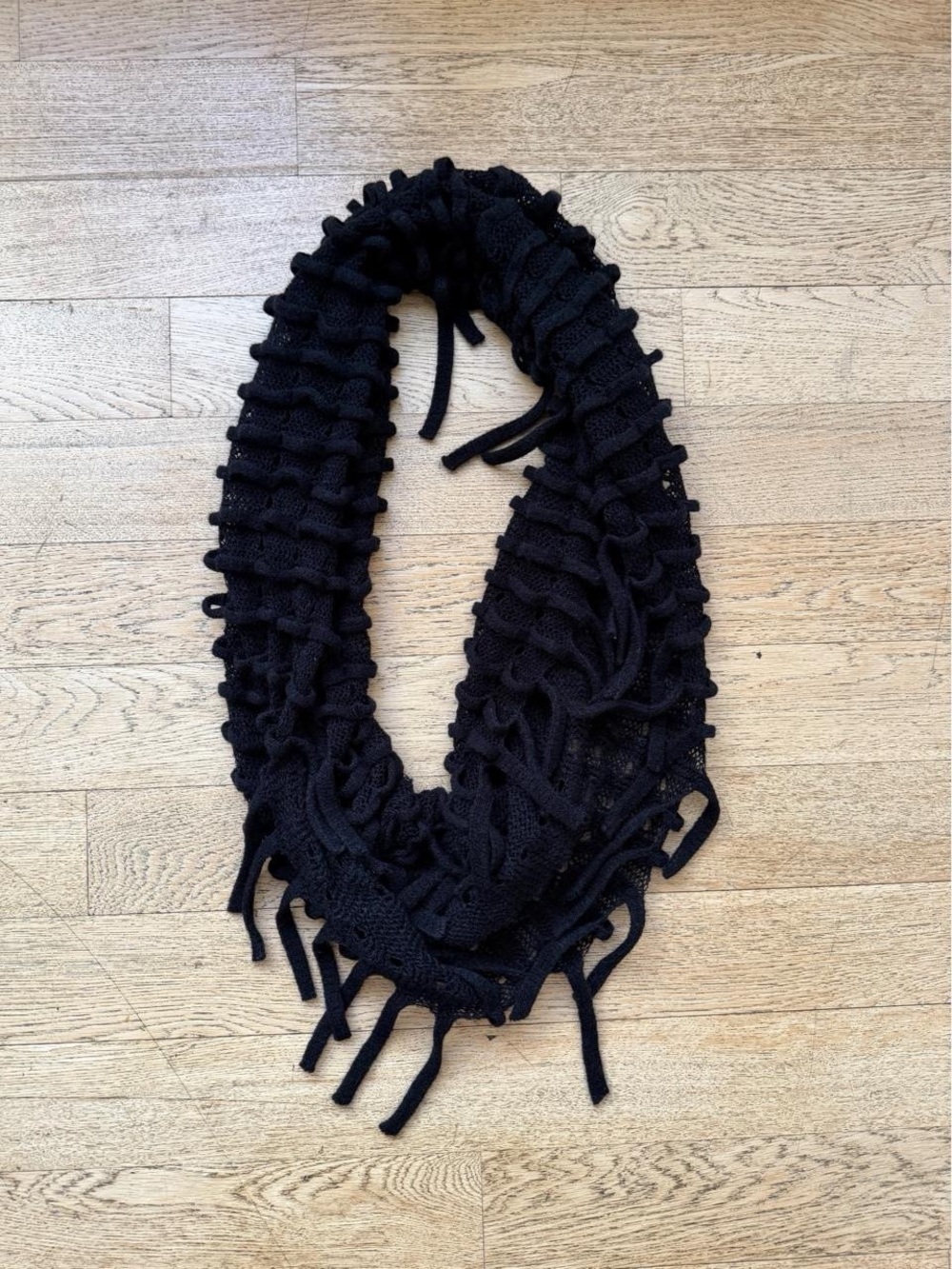 Cozy Black Knit Infinity Scarf with Fringe